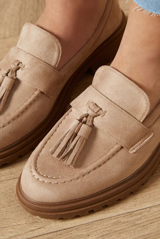 Mocassin en daim noir avec pompon