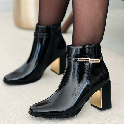 Bottines en synthétique avec bride métallique doré