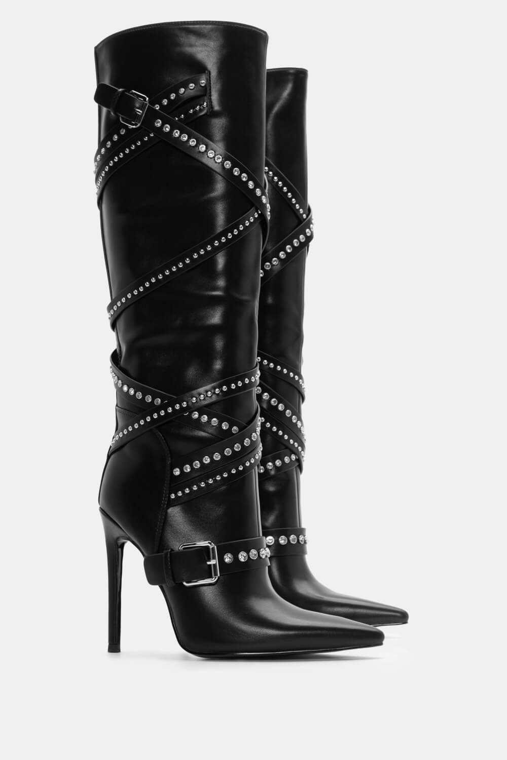 bottes pointues avec multiples brides cloutées