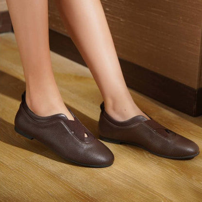 ballerines en cuir à brides élastiques croisées